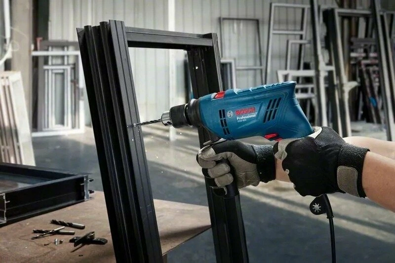 Ударная дрель Bosch GSB 600 06011A0320